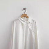 loose-fit solid color cotton long sleeve shirt