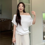 white loose off-shoulder top